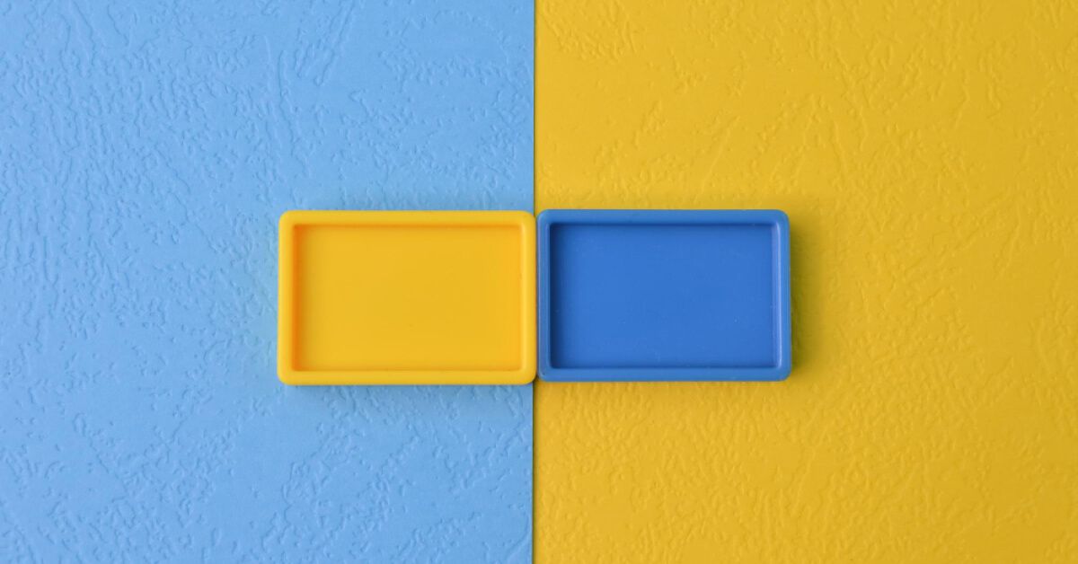 Yellow and blue blocks against yellow and blue backdrops